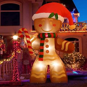 Inflatable Gingerbreadman holding a candycane as Christmas inflatable decorations