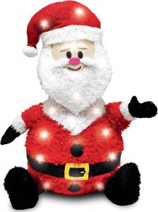 A Santa in standard costume with a metal frame underneath which has mini white lights lighting him up