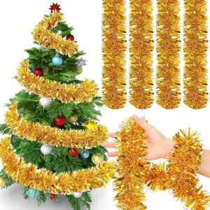 Gold colored tinsel hangs in rows in the upper right corner while an arm has the garland draped over it and a tree takes up the left 1/2 with a photoshopped picture of the garland wrapped around it