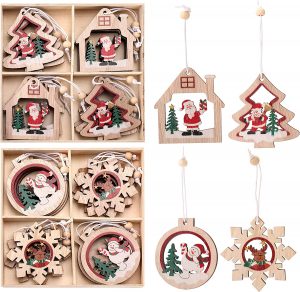 wooden tree ornaments with different Christmas related scenes in the middle