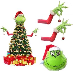 A picture of a decorated Christmas tree with presents at the bottom. A grinch head with Santa hat is used as the tree topper and arms sticking out of each side holding ornaments. To the right is a picture of each of the three parts